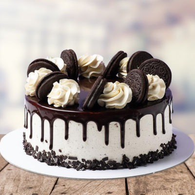 Oreo Dropping Vanilla Cake